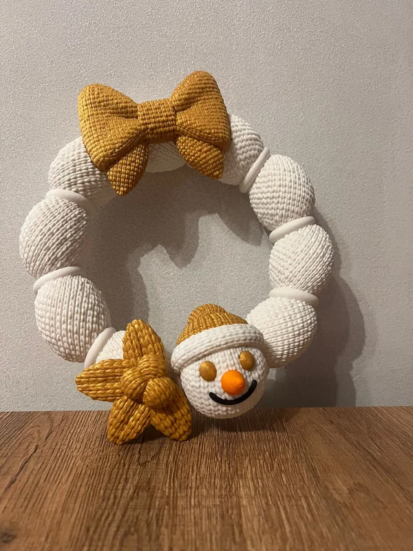 Couronne de Noël avec bonhomme de neige